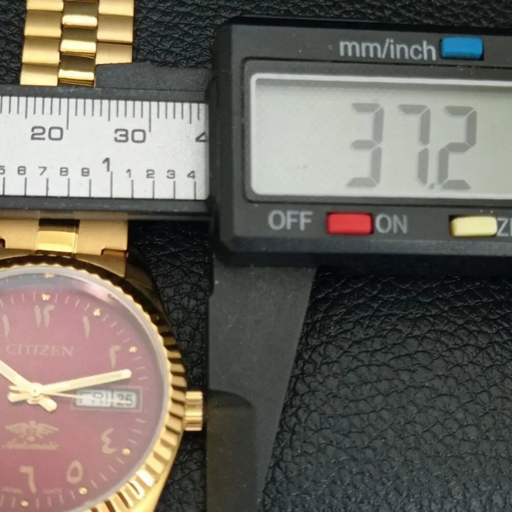 Vintage 1985 Citizen Automatic Mens Gold Watch W/daydate & Red accents